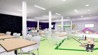 Sente em uma das mesas no Quarteto Massa Pizzaria Temática em Taguatinga