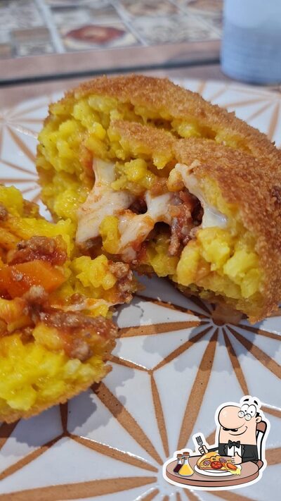 Prova una pizza al ristorante L'ANGOLO Pizzeria Ristorante