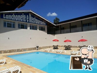 Você pode espairecer no na área externa do Restaurante Do Adriano